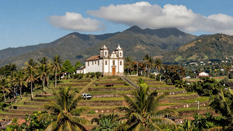 Portuguese colonial church on hillside in East Timor surrounded by tropical vegetation and rice fields representing Timorese Catholic dating culture